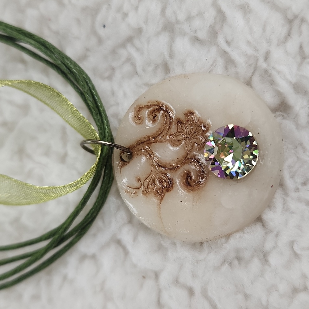 Elegant White Pendant Necklace with Green Ribbon